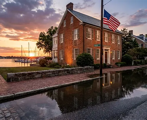 Sell coastal Hampton Roads home Norfolk sea level rise Sewells Point land subsidence Vision 2100 FEMA SFHA NFIP Hal Emmy Jones husband wife People First House Buyers 26 years